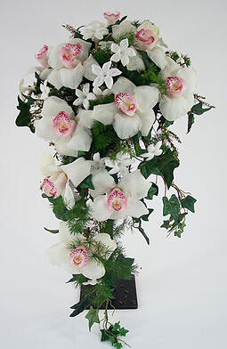 Cascade with white orchids