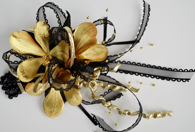 Gold and Black Orchid wrist corsage