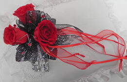 red and black glitter prom corsage